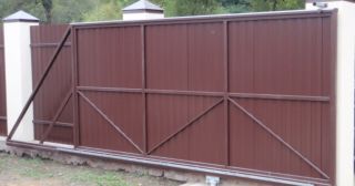 Купить откатные ворота из профнастила Новодвинск, цена от 1763 руб.